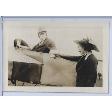 Mrs. Ovington handing Earle Ovington the Letter to Mayor Fitzgerald, Dropped in the First Aero plane Flight Over Boston, June 15th, 1911. Mrs. Ovington handing Earle Ovington the Letter to Mayor Fitzgerald, Dropped in the First Aero plane Flight Over Boston, June 15th, 1911.