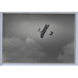 Photo of Early Aviator Eugene Ely in his Curtis Bi-plane.  Photo by C. H. Chase